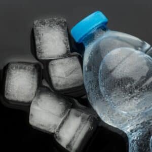 Ice cubes and water bottle top view, illustrating an LG refrigerator ice maker diagnosis