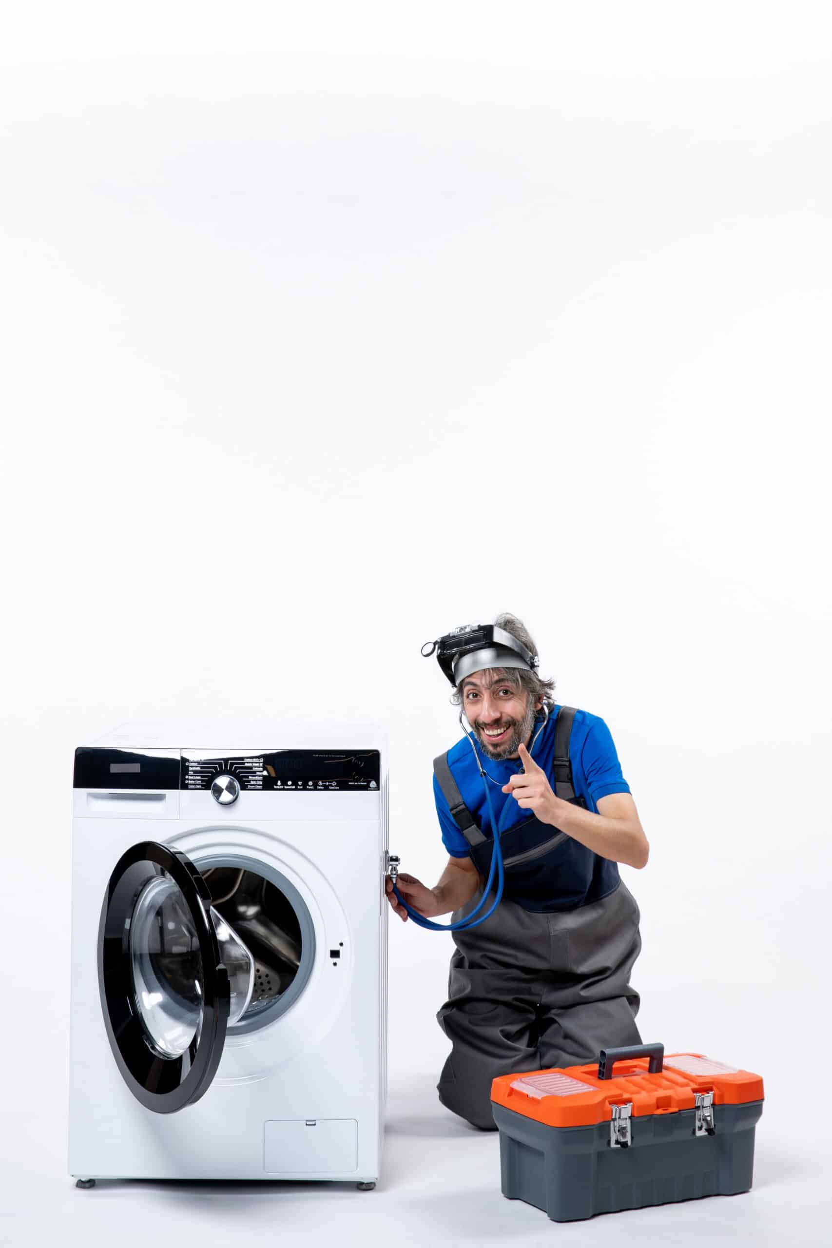 Repairman putting a stethoscope on a washing machine while sitting nearby, illustrating Whirlpool washer F08 error code water heating fault