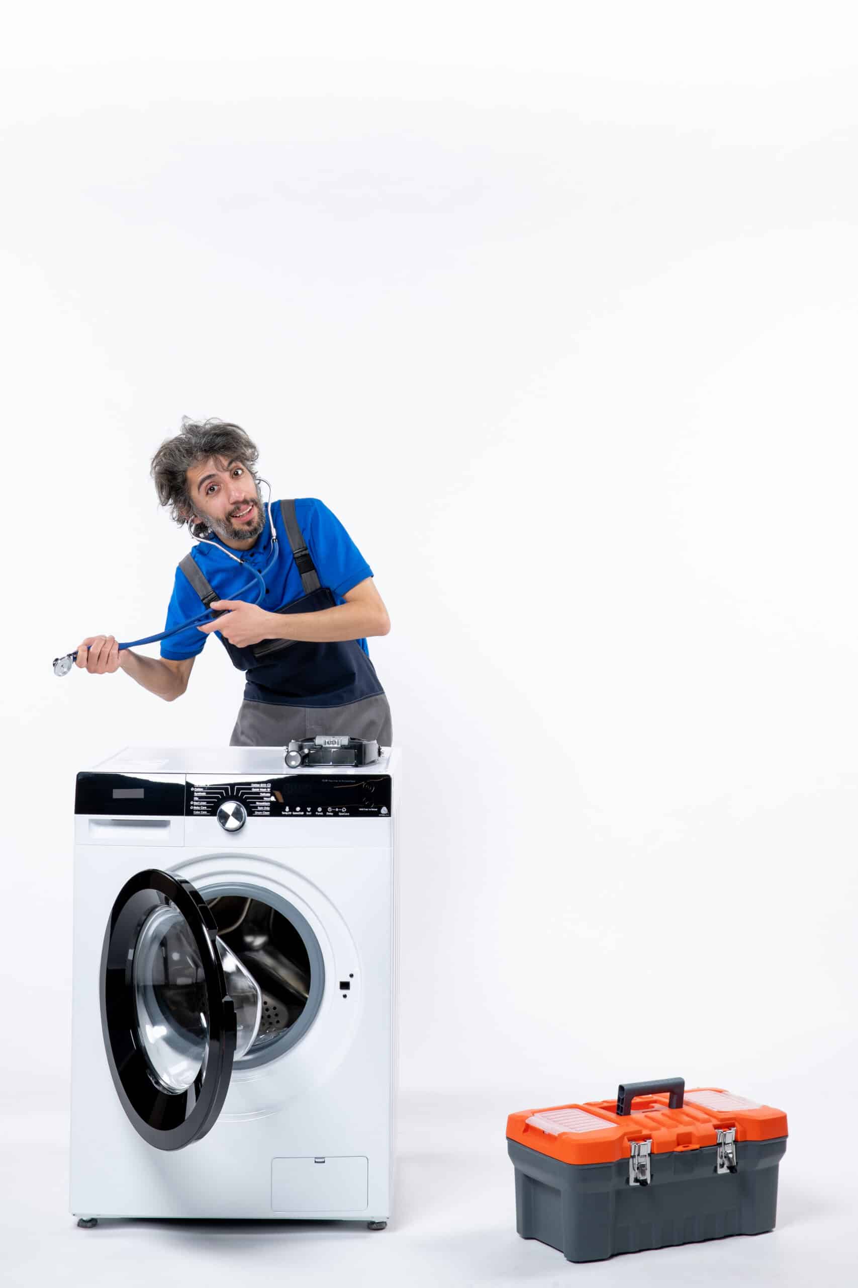 Repairman holding a stethoscope with both hands next to a washing machine, illustrating LG washer error code LE motor locked fault