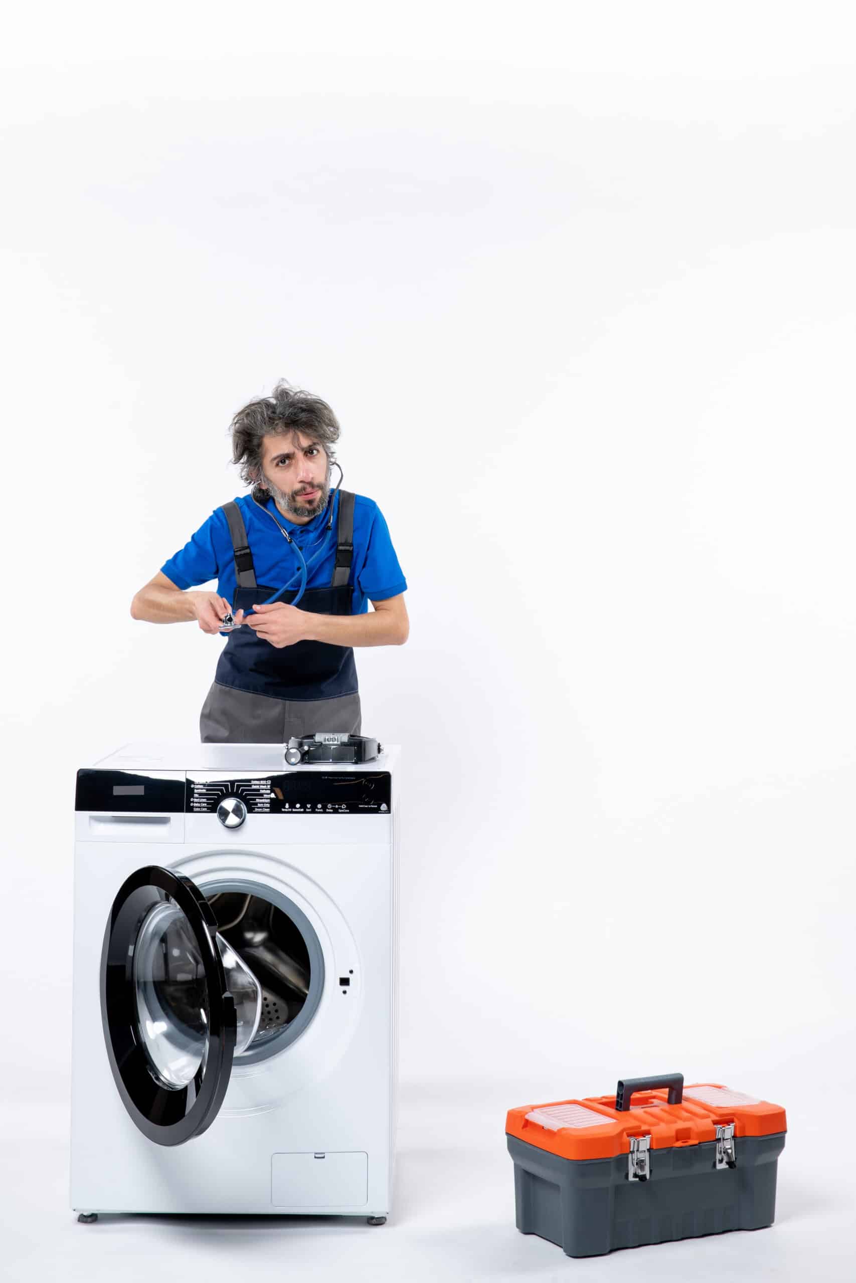 Repairman standing with a stethoscope next to a washing machine, illustrating Whirlpool washer error code F13 dispenser or door lock fault