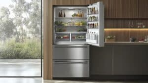 Modern stainless steel refrigerator with a separate freezer compartment