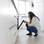 Open oven door, illustrating GE oven error code F9 door lock circuit fault