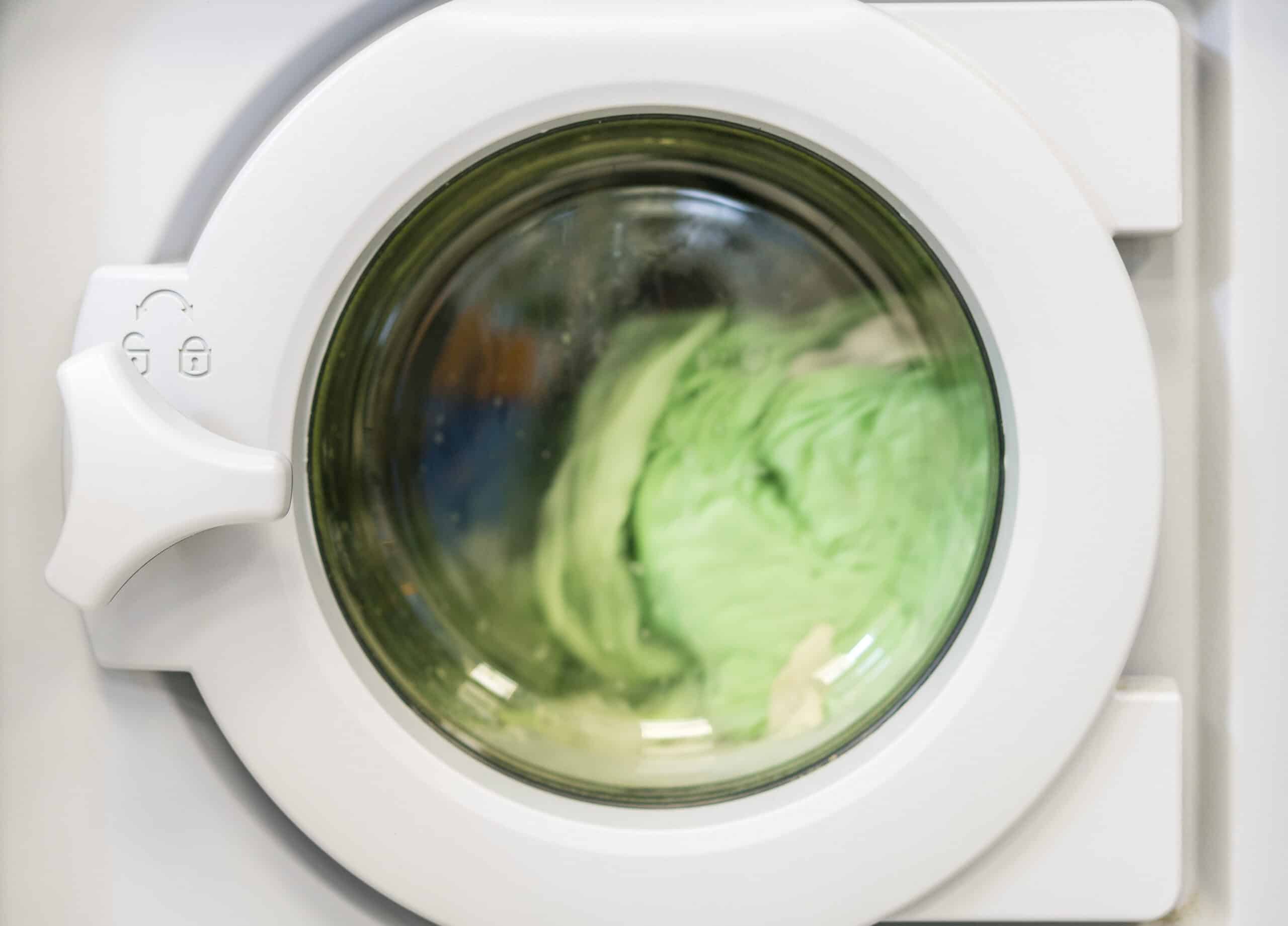 Washing machine drum spinning with laundry inside