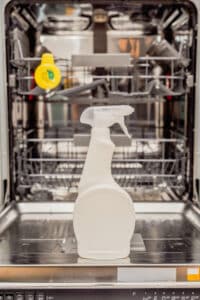 Cleaning spray used to fix a dishwasher that is not cleaning dishes properly