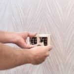 Electrician repairing a power outlet, illustrating Whirlpool dryer error code PF power failure memory