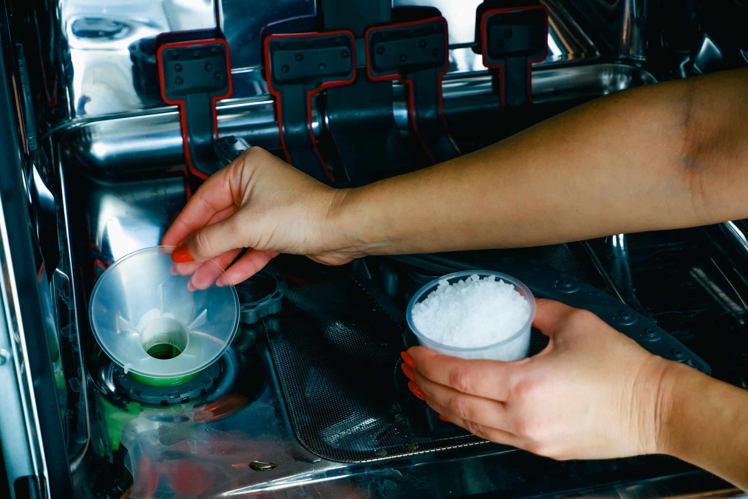 Pouring dishwasher salt to fix hard water white residue on dishes